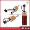 Free flow stainless wine/bottle pourer with tiny cap