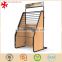 Portable metal carpet display rack for retail shop with advertising board