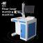 Table top fiber laser marking machine on white