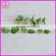 green ornamental artificial plastic foliage plants