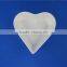 white ceramic heart shaped bowl
