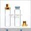 clear glass vial with cap and inner