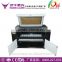 Guangzhou Hanniu 1300*900mm UD-1390 co2 laser paper cutting machine with up and down table