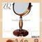 Iron with red bronze antique cosmetic mirror