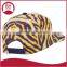 Short brim snapback hat with an adjustable plastic snapback strap closure