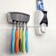 Automatic toothpaste dispenser & toothbrush holder