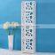 white self-assembled plastic shower corner shelf for towel