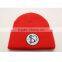 Custom knitted beanie hat with applique embroidery