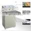 Plastic Grain Vertical Vacuum Packaging Nozzle Type Vaccum Sealer Machine