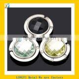 Magnetic Folding Metal Bag Hanger thumbnail-1