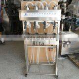 4 Heads Toilet Water Vacuum Filling Machine thumbnail-1