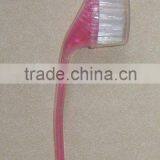 pink handle plastic facial brush