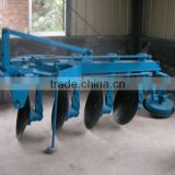 double way disc plough ,fitted with tractor with three point linkage