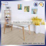 China Supplier Industrial Furniture Glass Dining Table With Wooden Legs thumbnail-2