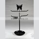 Metal jewelry display with butterfly on the top