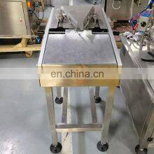 Hot Sales Bag Opener For Automatic Chicken Packing Machine for Whole Chicken Packaging Fresh Chicken Packing Machine thumbnail-2