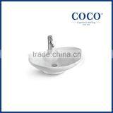 COCO bathroom 650mm ceramic oval boat shape sink counter top wash basin