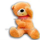 light brown stuffed doze bear scarf teddy bear