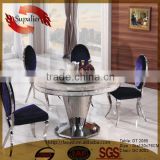 dining room stainless steel centre table with leather chair