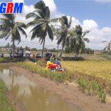 Cheapest Price Mini Rice Combine Harvester / Rice Reaper Working in Muddy Field thumbnail-2