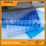 Transparent double-walled hollow channeled polycarbonate structured sheet