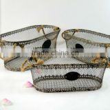 Shabby and chic decorative metal basket with wicker hanging