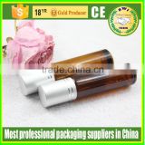 glass roll on bottle with stainless steel roller