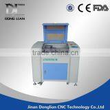 Jinan Donglian 6040 Cnc Laser Engraving Machine Cutting With Double Head thumbnail-2