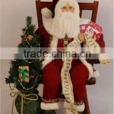 chirstmas sitting santa with lighted tree