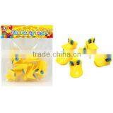 Yellow plastic toy duck whistle