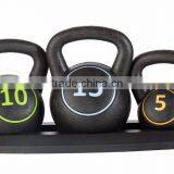 kettle bell , weight lifting , cement kettlebells