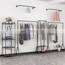 Custom gold color metal material clothing wall display racks stand for garment