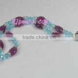 7.5" 2 Rows 8mm Round Blue Faceted Crystal and Oval Purple Gemstone Bracelet. thumbnail-1