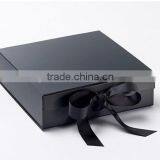 Luxury Stylish Foldable Gift Packaging Box With Black Ribbon Design Supplier