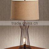 11.1-10 A Metal Rod Cage An Industrial-inspired Metal Nightlight Metal Rod Cage Table Lamp