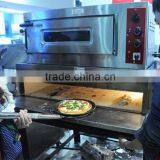 Stainless steel round shaped pizza peel in baking equipment