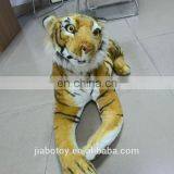 Siberia ,realistic tiger plush toy wild animal different style plush tiger posed in a realistic stance.