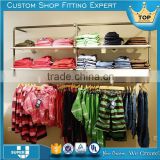 sundry clothing store tension fabric racks and displays stand shelves for textiles