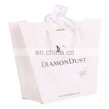 Wholesale Custom Logo Clothing Shopping Bag Packaging Gift White Kraft Paper Bag With Rope Hande thumbnail-4