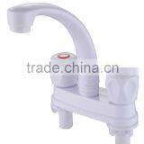 Inexpensive White Hot Cold Double Plastic Basin Faucet thumbnail-3