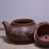 Flower Hand Carving Tea Pot With Ceramic Side Handle thumbnail-2