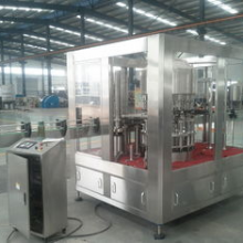 Glass Bottle Filling Machine for Liquid Packing With Rotary Star Wheel Design thumbnail-3