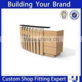 Clothing-shop-cash-counter-design Wood u Shaped Cash Counter