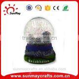 Hot Sale Polyresin Kazakhstan Souvenir Snow Globe for Sale thumbnail-1