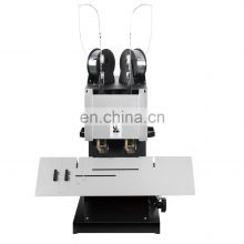 Double-heads wire binding machine for netbooks