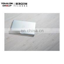 Factory Direct Cheap Super High Gloss 8mm 12mm Ac4 Middle Embossed Grey Waterproof Hdf Wooden Laminate Flooring Price thumbnail-1