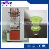 Automatic Yogurt Cup Filling and Sealing Machine thumbnail-1