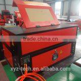 Fabric Laser Cutting Machine 40w Desktop Laser Machine for Sale Sandpaper Cutting Machine thumbnail-3