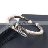 Top Designer Nail Design Bracelet With Real Python Skin Cover thumbnail-1