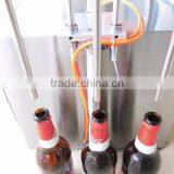 Small Semi Automatic Bottom up Digital Liquid Milk Beer Bottle Filling Machine thumbnail-3